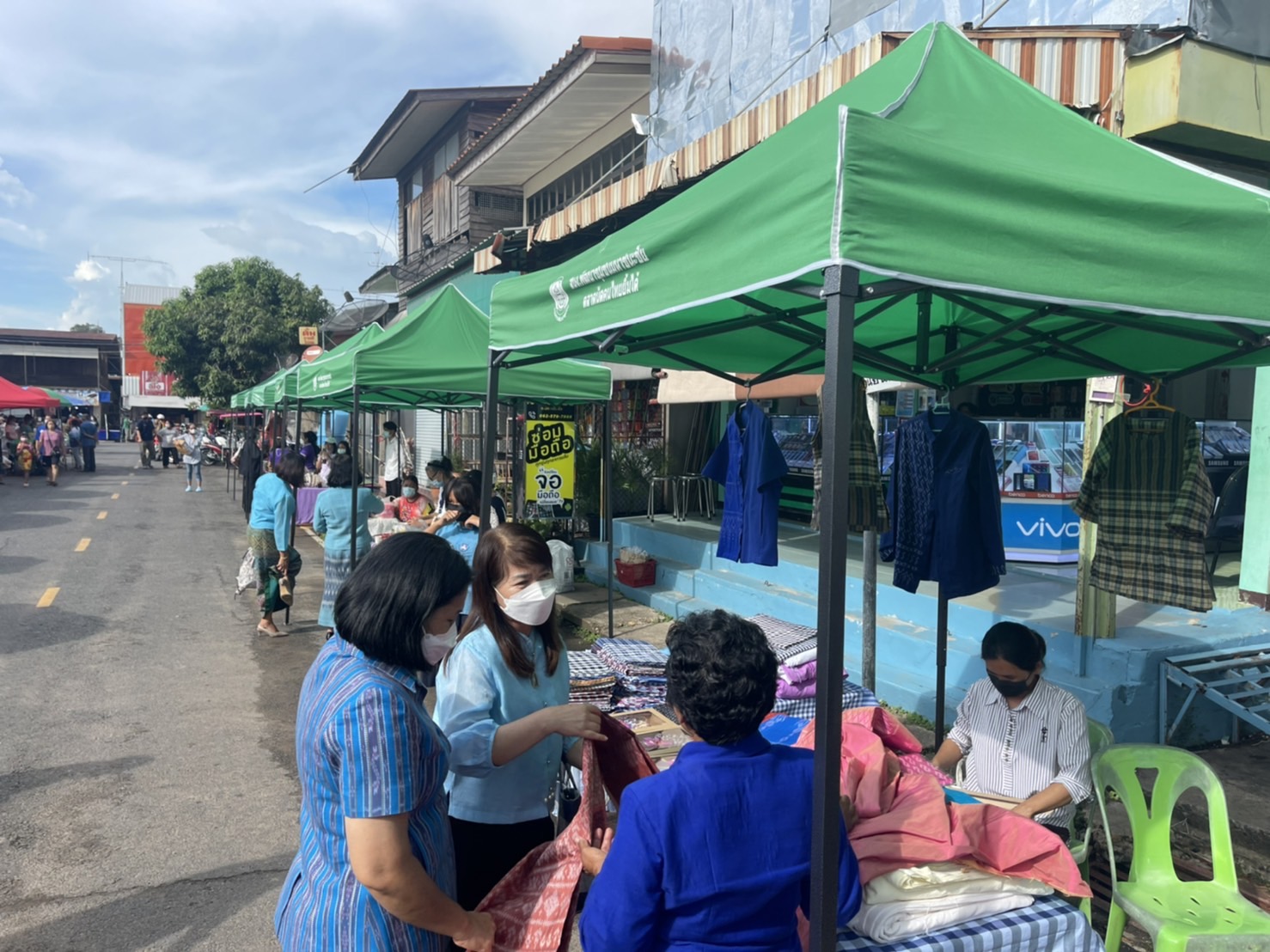 พช.ยโสธร   ร่วมกิจกรรมเปิดตลาดนัดคนไทยยิ้มได้ระดับอำเภอ